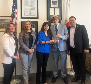 Senator Laird receives Legislative Champion of the Year award presented by Chancellor Sonya Christian