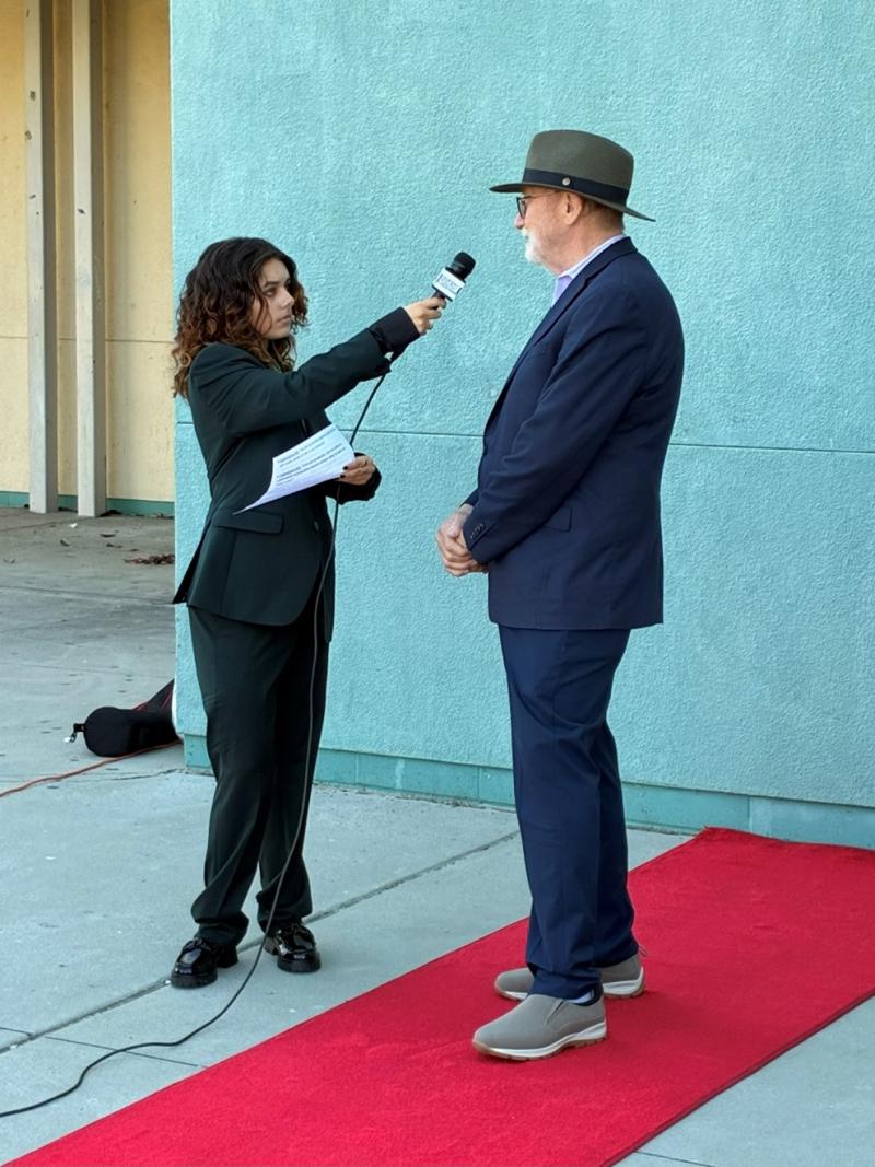 Senator Laird is interviewed on the red carpet at the Queer Youth Leadership Awards