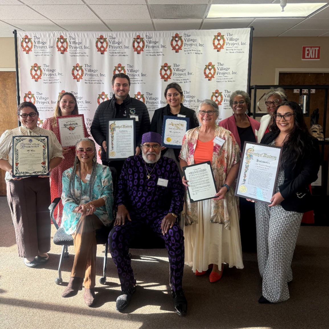 Monterey County District Representative Natalie Boston presents a Certificate of Recognition to Mel Mason.