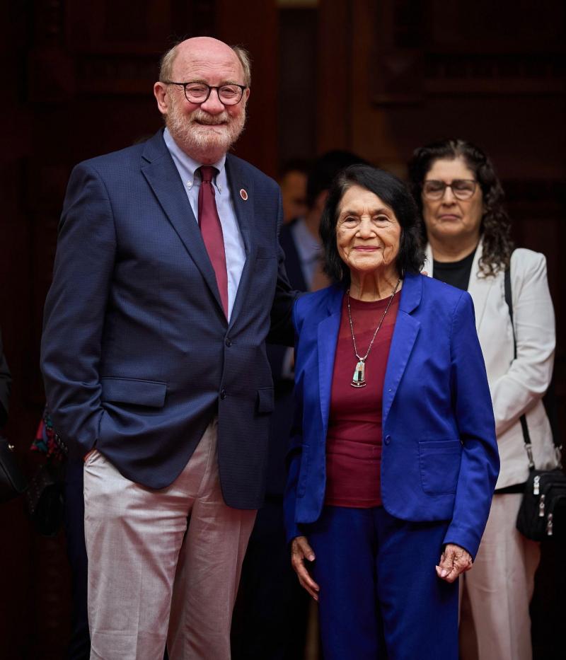 Senator Laird standing alongside Dolores Huerta on the Senate floor.