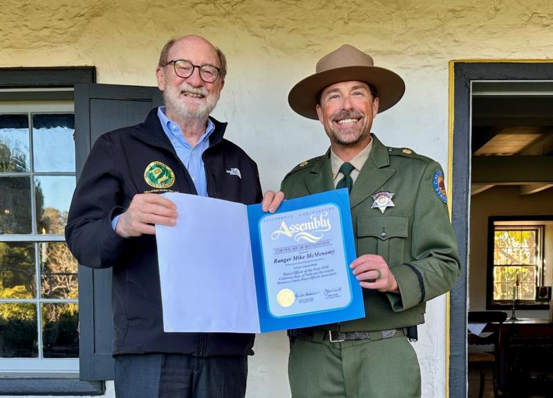 Senator Laird presenting an Assembly certificate to Chief Ranger Mike McMenamy.