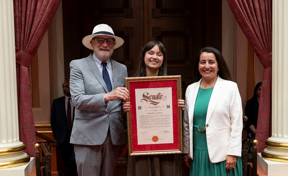 Senator Laird and Pro Tem Limón present a Senate certificate to Samantha Guerrero.
