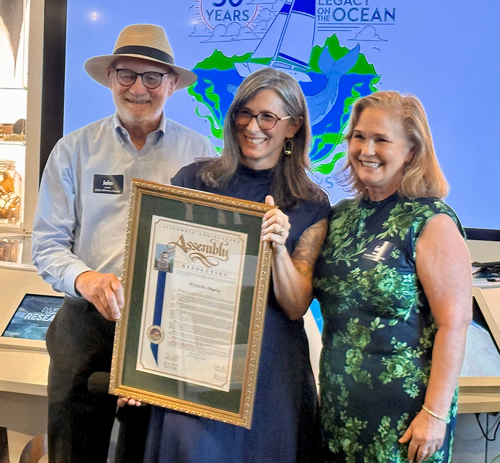 Senator Laird presents certificate with Assemblymember Pellerin to O’Neill Sea Odyssey.