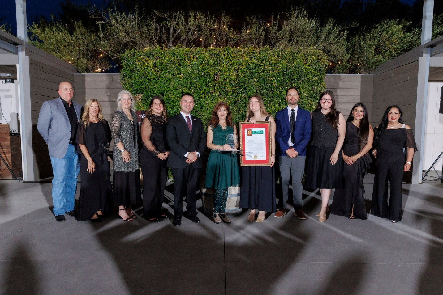 Natalie Boston presents Sandra Schwehr with a Senate resolution at the San Benito County Chamber of Commerce’s annual gala.