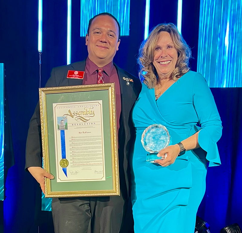 Team Laird presents a resolution to Geri LaChance.