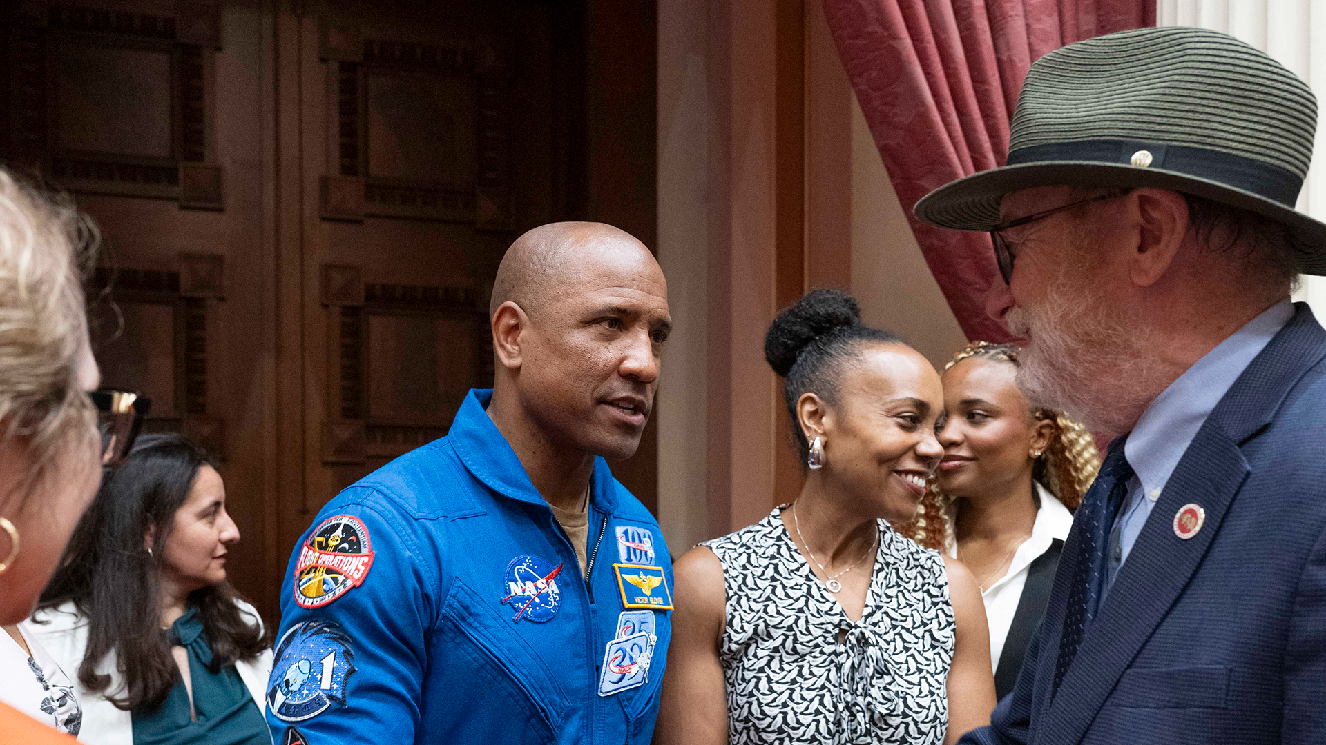 Senator Laird greeting NASA member
