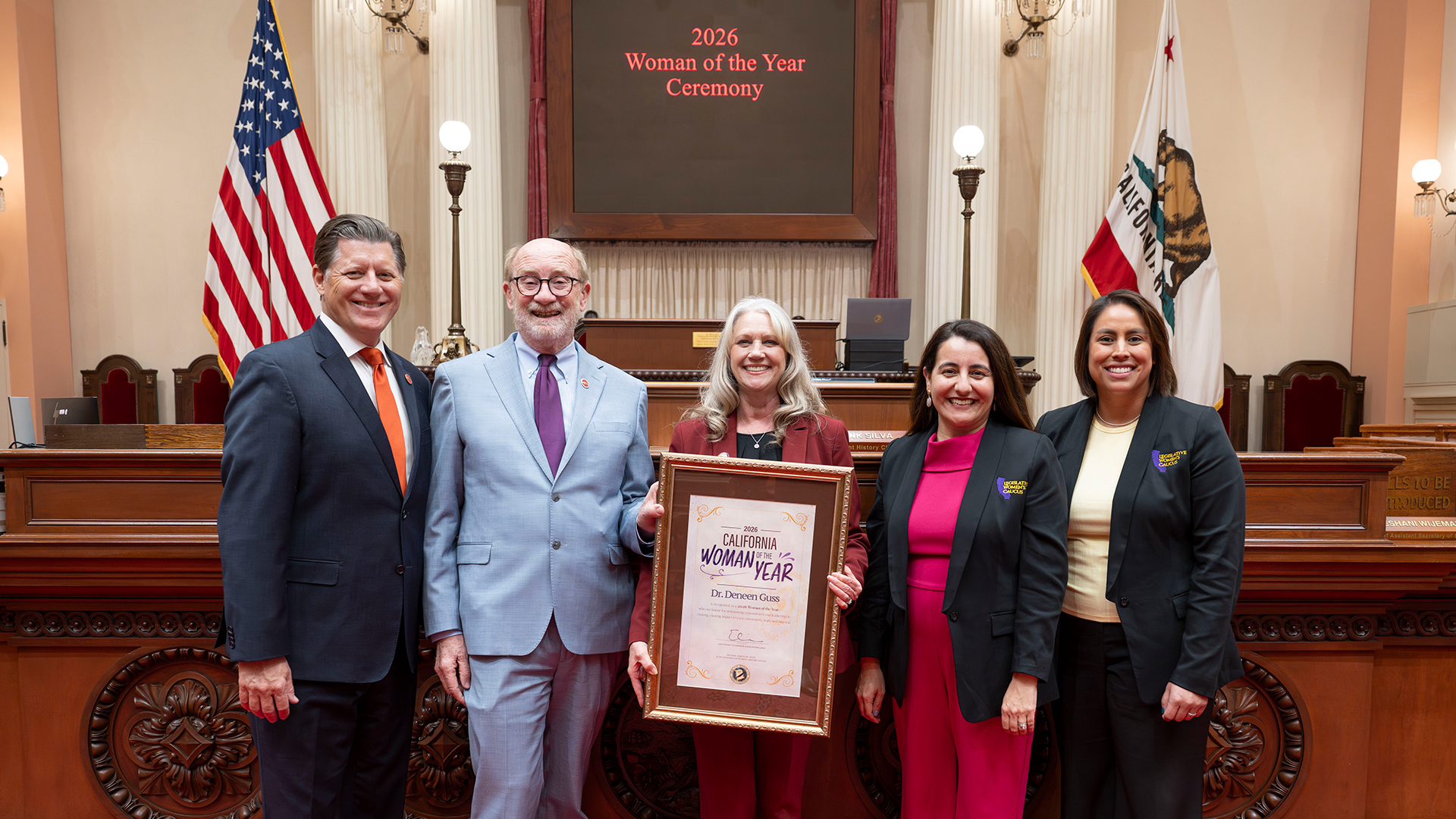 Senator Laird on the senate floor with the 2026 Woman of the Year winner